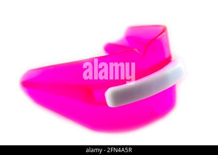 Giddaa Boil Bite Custom Fit Mouth Guard colorful mouth guard on white background Stock Photo