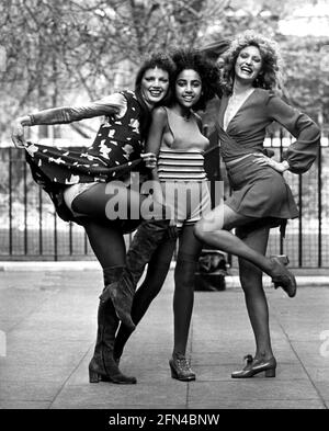 fashion, 1970s, ladies' fashion, three models in dress, hot pants and mini skirt, London, 1971, ADDITIONAL-RIGHTS-CLEARANCE-INFO-NOT-AVAILABLE Stock Photo