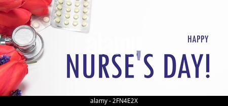 Flowers, phonendoscope and tablets - a banner with inscription Happy Nurse's Day on white Stock Photo
