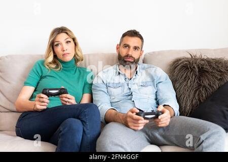 Boring Date. Excited Black Guy Playing Video Games and Ignoring Girlfriend  Next To Him Stock Image - Image of enjoy, conflict: 188745699