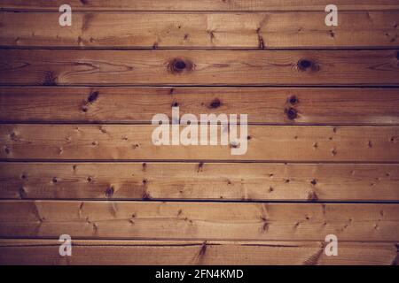 Medium brown wood texture background viewed from above. Close up plank wood table floor with natural pattern texture. Can be used as background for an Stock Photo