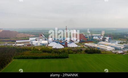 Loitsche Heinrichsberg, Germany. 13th May, 2021. The Zielitz potash mine in cloudy weather. According to the weather service, there may be showers and thunderstorms in Saxony-Anhalt at the weekend. (Aerial photo with drone.) Credit: Stephan Schulz/dpa-Zentralbild/ZB/dpa/Alamy Live News Stock Photo