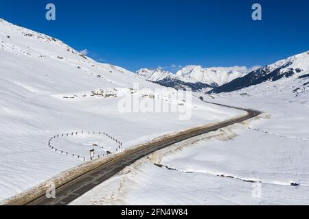 Aerial view of the Pla de Beret meadows in winter. Source of the river Noguera Pallaresa (Aran Valley, Catalonia, Spain, Pyrenees) Stock Photo