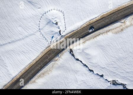 Aerial view of the Pla de Beret meadows in winter. Source of the river Noguera Pallaresa (Aran Valley, Catalonia, Spain, Pyrenees) Stock Photo