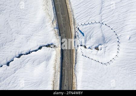 Aerial view of the Pla de Beret meadows in winter. Source of the river Noguera Pallaresa (Aran Valley, Catalonia, Spain, Pyrenees) Stock Photo