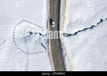 Aerial view of the Pla de Beret meadows in winter. Source of the river Noguera Pallaresa (Aran Valley, Catalonia, Spain, Pyrenees) Stock Photo