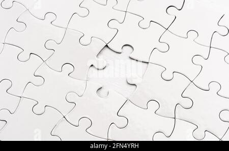 Close up view of unfinished jigsaw puzzle Stock Photo