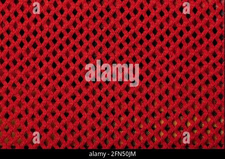 Pattern of red fabric material macro close up view Stock Photo