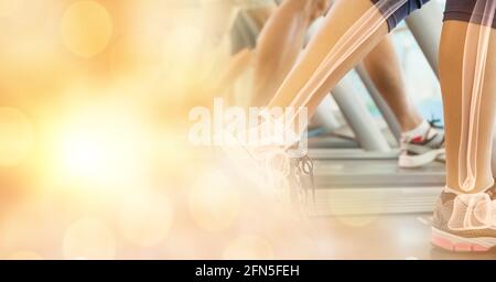 Composition of spots of light over woman running on treadmill with bones showing Stock Photo