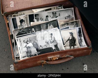 A suitcase full of old photos, for sale at Brighton Marina Giant Boot Fair Stock Photo