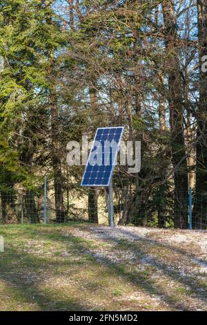 Single solar cell on a metal post Stock Photo