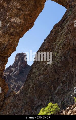 Volcanic rock formation known as the Queens Slipper, Zapatilla de la Reina, carved out by wind and rain erosion in the Las Canadas del Teide National Stock Photo