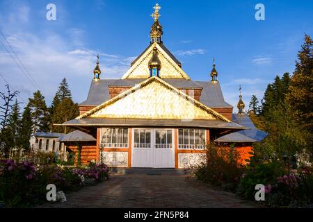 Pistyn village Ukraine October 10, 2020: An old wooden church is included in the UNESCO in the Carpathian village of Pistyn, Ukraine. new Stock Photo