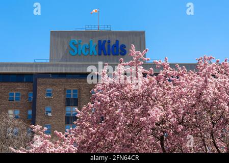 SickKids Hospital Logo on top of building. Springtime season arrival in Toronto, Canada Stock Photo