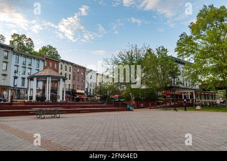 Kingston, NY - USA- May 12, 2021: a landscape view of the shops and restaurants on West Strand Street in The Rondout, Kingston’s historic waterfront Stock Photo