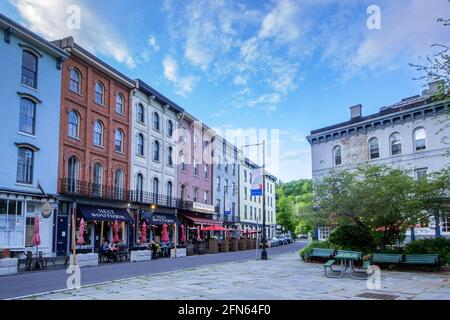 Kingston, NY - USA- May 12, 2021: a landscape view of the shops and restaurants on West Strand Street in The Rondout, Kingston’s historic waterfront Stock Photo