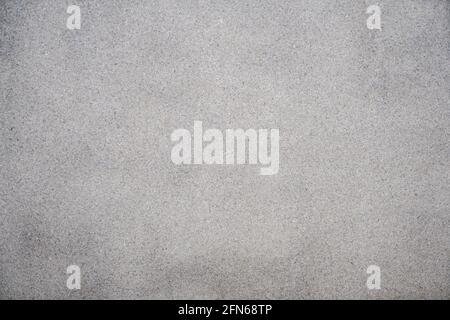 Marbled pattern of a smooth gray stone slab, natural stone cut and polished Stock Photo