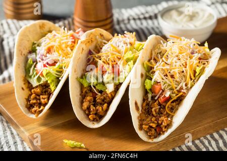 Homemade American Soft Shell Beef Tacos with Lettuce Tomato Cheese Stock Photo