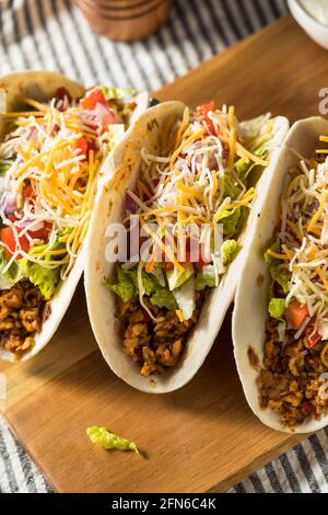 Homemade American Soft Shell Beef Tacos with Lettuce Tomato Cheese Stock Photo