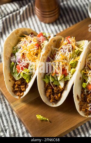 Homemade American Soft Shell Beef Tacos with Lettuce Tomato Cheese Stock Photo