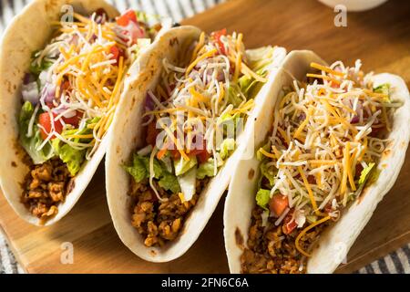 Homemade American Soft Shell Beef Tacos with Lettuce Tomato Cheese Stock Photo