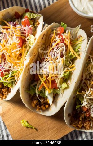 Homemade American Soft Shell Beef Tacos with Lettuce Tomato Cheese Stock Photo