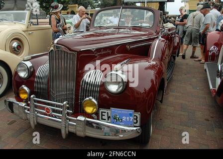 The high art of driving in style: Front view of a Packard Super Eight One-Sixty cabriolet classic car from 1941 at Art Deco Weekend in Napier. Stock Photo