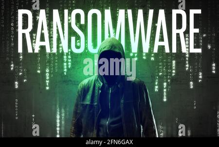 Faceless hacker with inscription concept Stock Photo