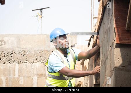 a building contractor using a square Stock Photo