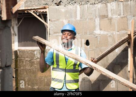 a carpenter on a construction site Stock Photo