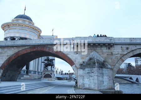 Stone Bridge, behind the Archeology Museum at Skopje in Macedonia. Stone Bridge is considered a symbol of Skopje. Stock Photo