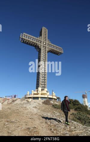 SKOPJE, MACEDONIA - DECEMBER 23: Millennium Cross at Skopje in Vodno Hill on December 23, 2016 in Macedonia. Millennium Cross is a 66 meters tall cross situated on the top of the Vodno Mountain. Stock Photo