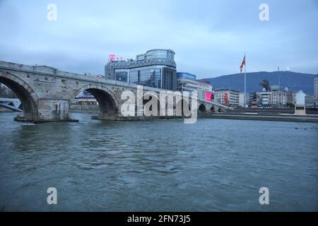 SKOPJE, MACEDONIA - DECEMBER 25: Stone Bridge at cloudy day in Skopje on December 25, 2016 in Macedonia. Stone bridge is considered a symbol of Skopje. Stock Photo