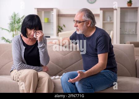 Old couple having argument at the home Stock Photo
