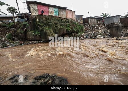 Nairobi, Kenya. 14th May, 2021. David Odhiambo stands outside his house ...