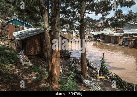 Nairobi, Kenya. 14th May, 2021. David Odhiambo stands outside his house ...