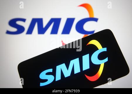Ukraine. 15th May, 2021. In this photo illustration the SMIC (Semiconductor Manufacturing International Corporation) logo of a Chinese semiconductor foundry company is seen on a smartphone and a pc screen. (Photo by Pavlo Gonchar/SOPA Images/Sipa USA) Credit: Sipa USA/Alamy Live News Stock Photo