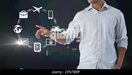 Composition of digital icons over caucasian man Stock Photo