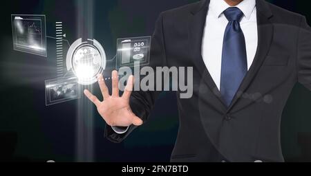 Composition of digital icons over caucasian businessman Stock Photo