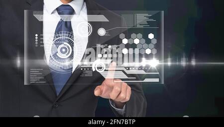 Composition of digital icons over caucasian businessman Stock Photo