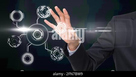 Composition of digital icons over caucasian businessman Stock Photo