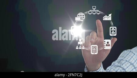 Composition of digital icons over caucasian hand Stock Photo
