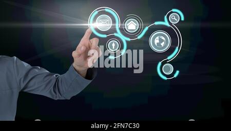 Composition of digital icons over caucasian businessman Stock Photo