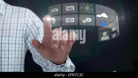 Composition of digital icons over caucasian man Stock Photo