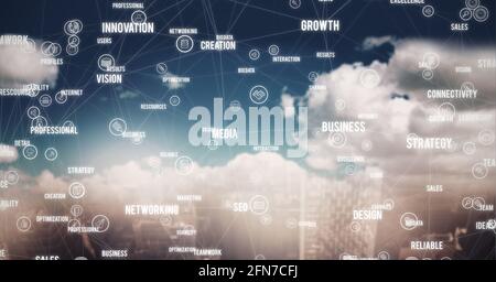 Network of connections and business concept texts against clouds in blue sky Stock Photo