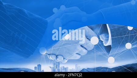 Network of connections over two businessmen shaking hands against cityscape Stock Photo