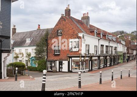 LEWES, EAST SUSSEX, UK - APRIL 29, 2012:  View of High Street and Harvey's Brewery Shop, a fine Georgian building Stock Photo