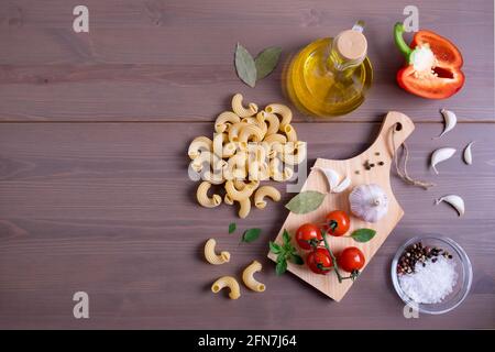 ingredients for making italian pasta cherry tomatoes Stock Photo - Alamy