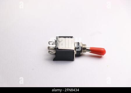 Simple on and off switch use to control power supply to various electronic hardware components Stock Photo