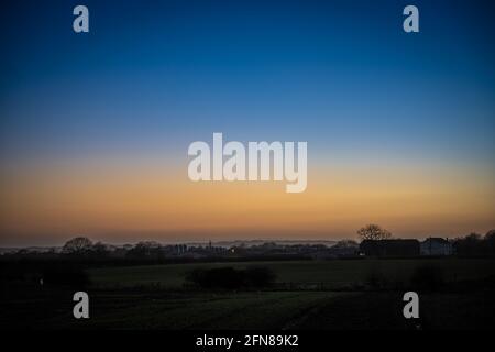 Mist slowly settles over generic farmland in Northern England. Stock Photo